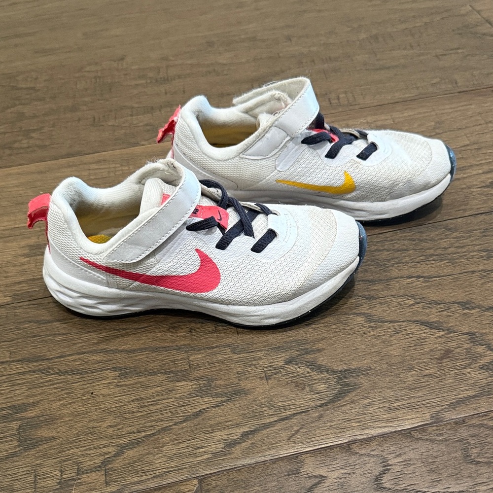 Nike Kids White Sneakers with Pink and Yellow Accents